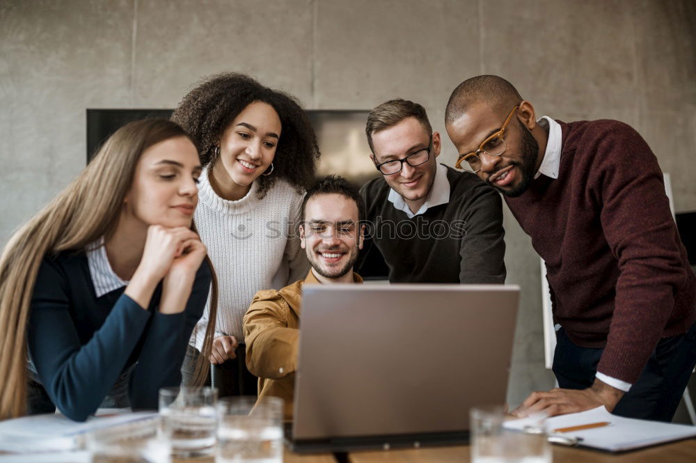 Similar – Image, Stock Photo Multiracial young people looking at a tablet computer