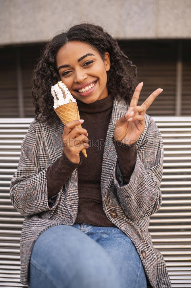 Similar – close up of a pretty black woman with curly hair smelling a rose flower sit on bed