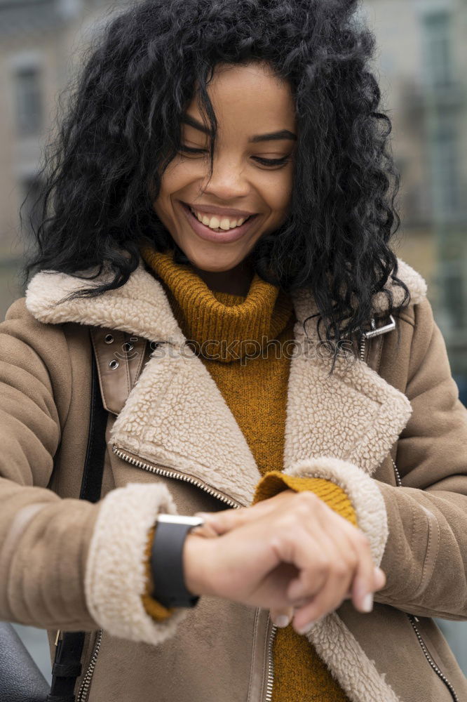 Similar – Young black woman drinking coffee wandering in the streets of Madrid on winter