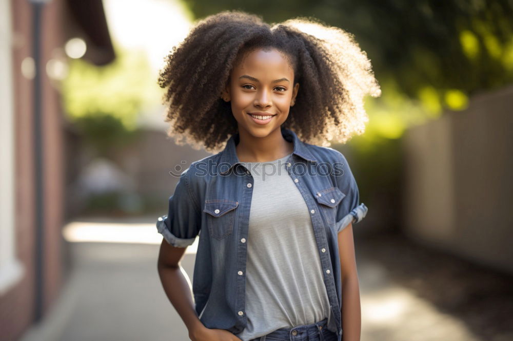 Similar – Image, Stock Photo Portrait of a cheerful young african woman standing outdoors