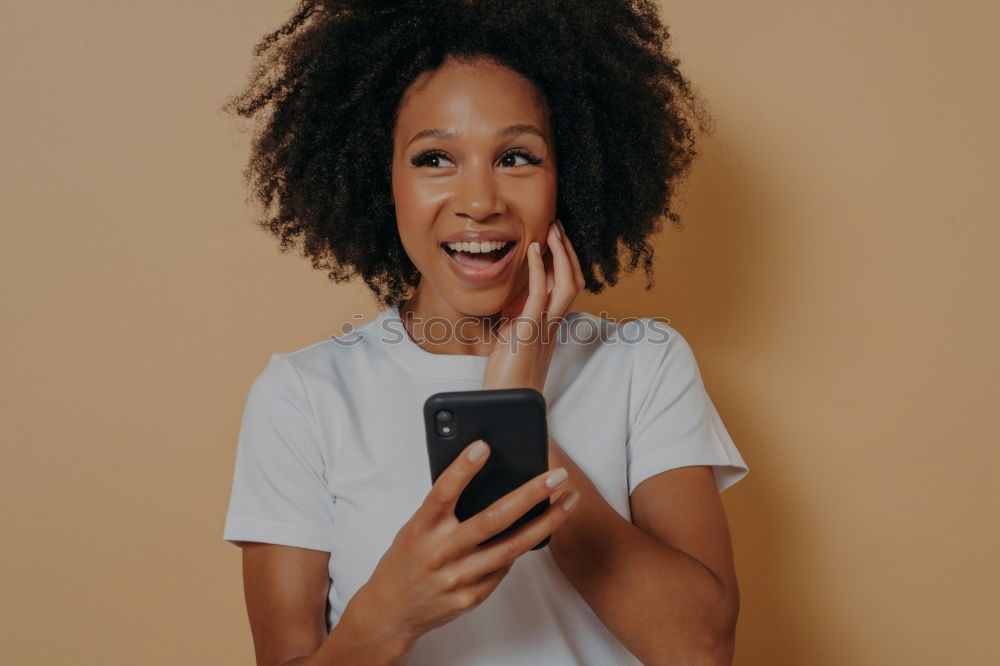 Similar – Image, Stock Photo Young adult woman typing message on smart phone in cafe