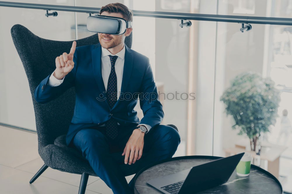 Similar – Image, Stock Photo afro businessman playing virtual reality simulation