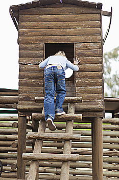 Similar – Image, Stock Photo Blonde boy climbing a ladder at a treehouse