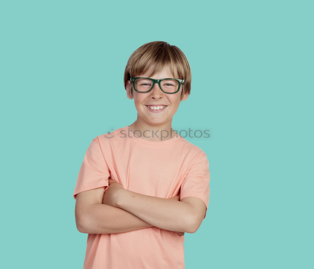 Similar – happy boy drinking orange juice on blue background