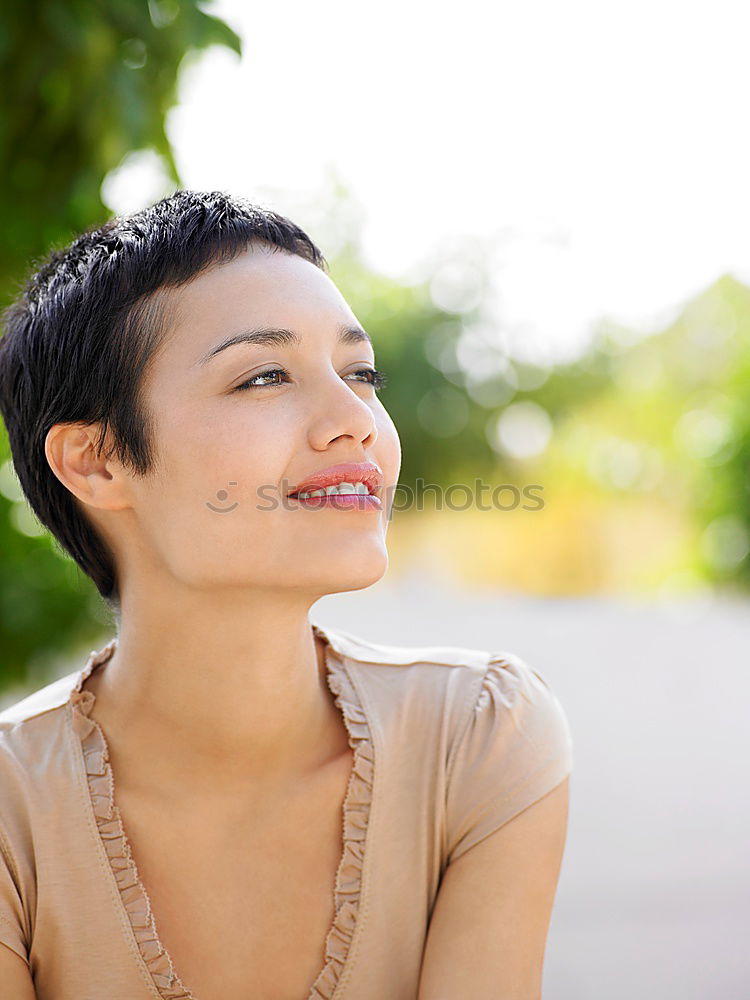 Similar – Image, Stock Photo Mixed female with afro hairstyle smiling in urban park.
