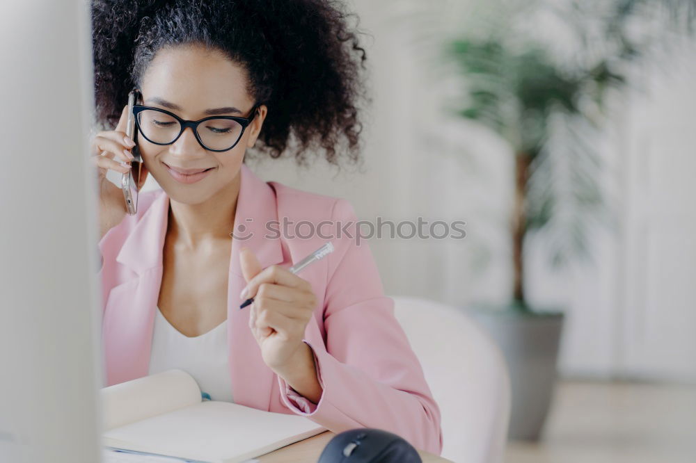 Similar – Image, Stock Photo afrcian woman on her cellphone while looking at laptop