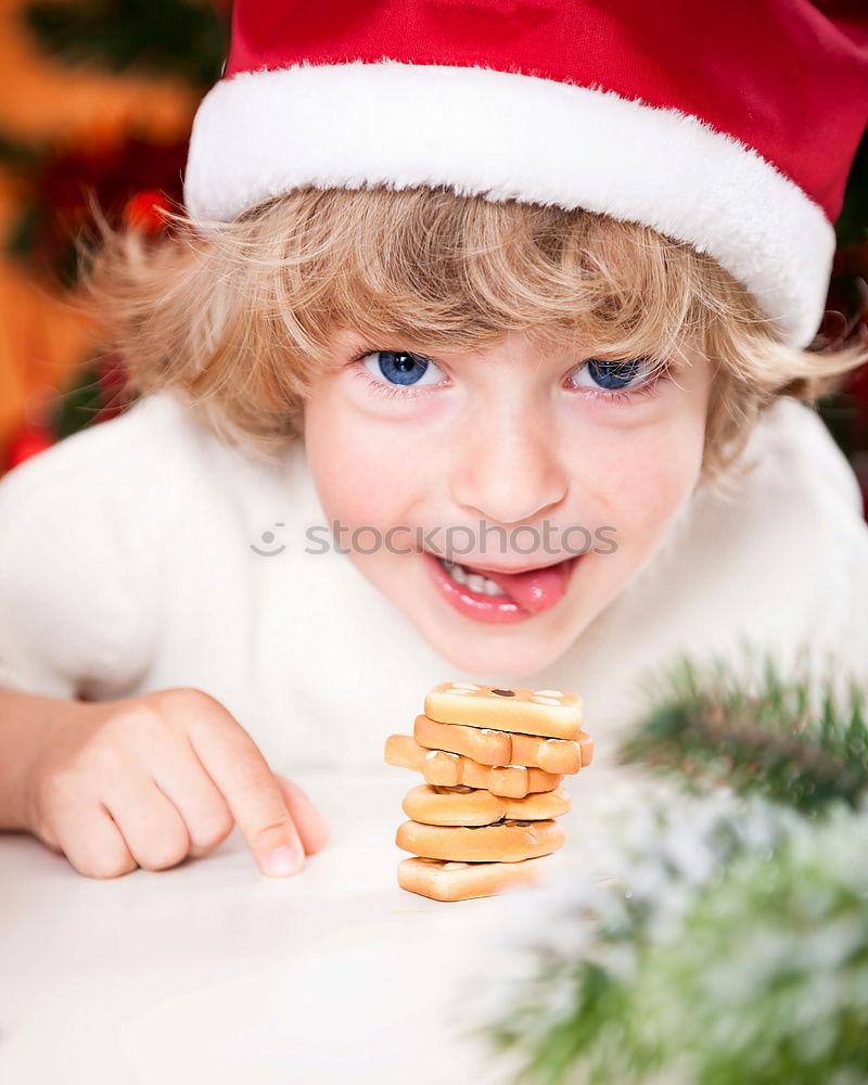 Similar – Image, Stock Photo Little kid decorating Christmas biscuits at Christmas day