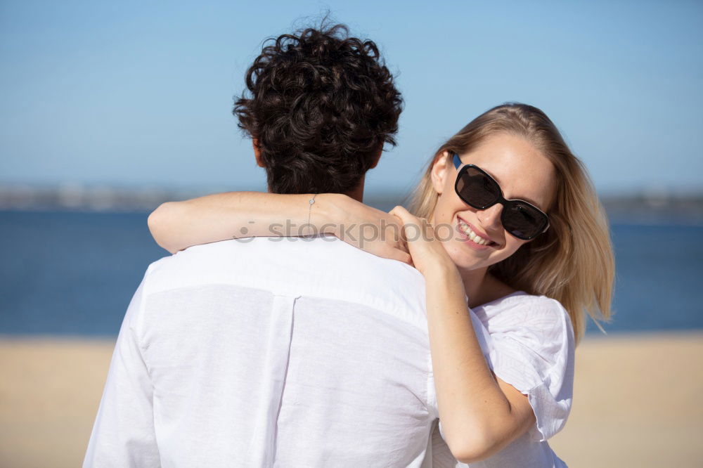 Similar – Image, Stock Photo Interracial couple having fun on the rooftop