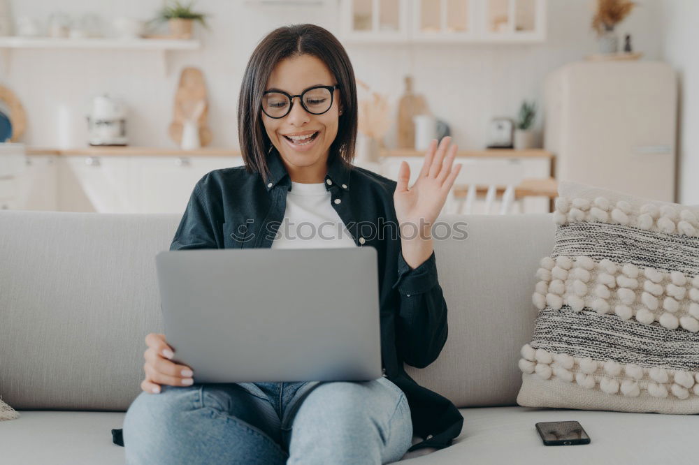 Similar – Image, Stock Photo afrcian woman on her cellphone while looking at laptop