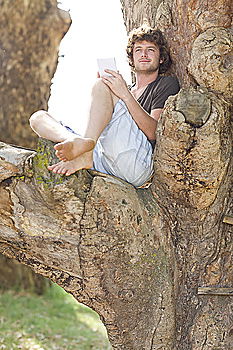 Similar – Image, Stock Photo Two teenagers climbing in a tree