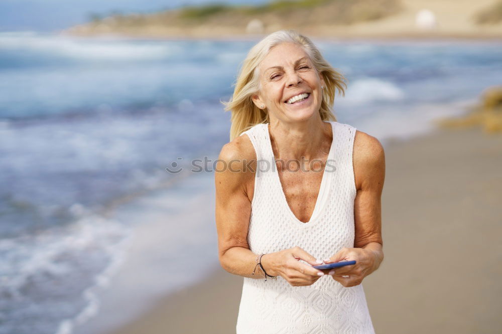 Similar – Senior old woman grey hair sitting by the swimming pool