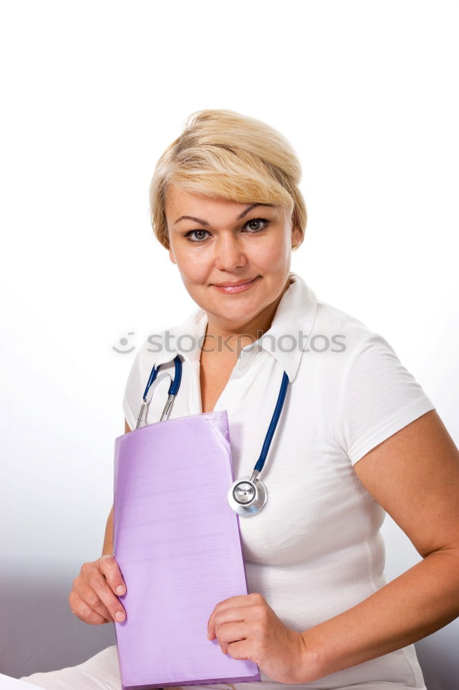 Similar – Female cosmetician applying a facial mask with special cosmetic brush. Beautiful cosmetician looking to the camera