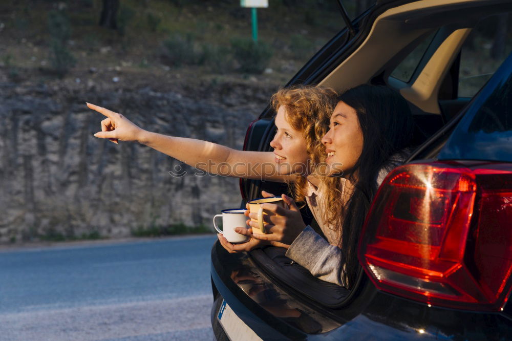 Similar – Image, Stock Photo funny child girl playing driver, sitting on front seat in car