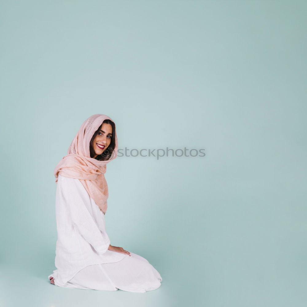 Similar – Image, Stock Photo Beautiful serious thoughtful and sad black woman covering her head with sheet in bed