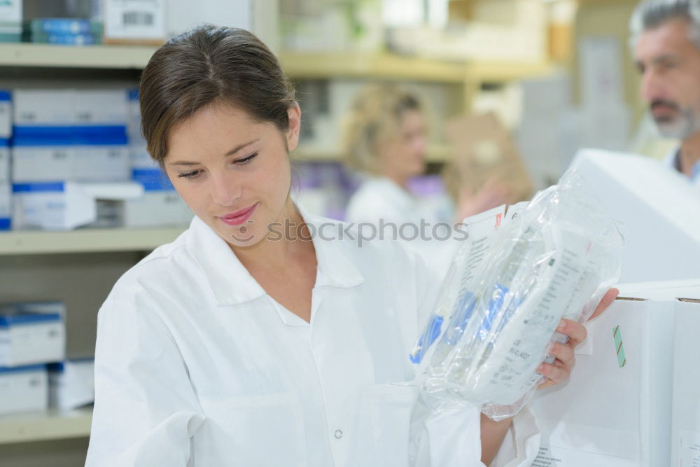 Similar – Image, Stock Photo Women standing and working in lab