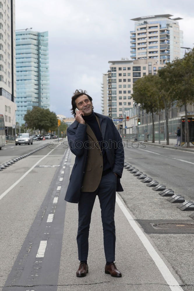 Similar – Portrait of young skateboarder man with bad boy face in the middle of the street.