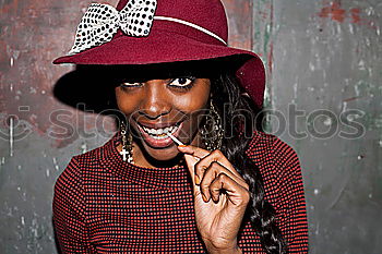 Similar – Image, Stock Photo Black man with afro hair putting on sunglasses. Sunglasses and a