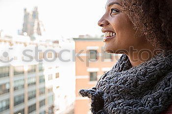 Similar – Young black woman drinking coffee wandering in the streets of Madrid on winter