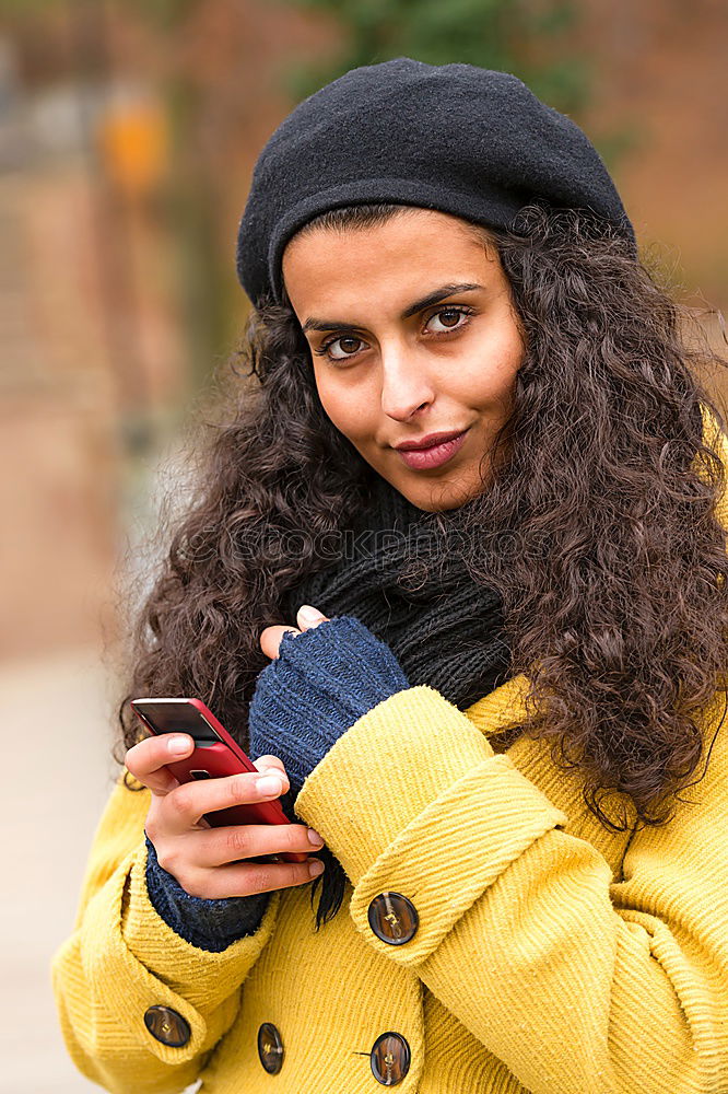 Similar – Image, Stock Photo Young Arab woman texting with her smart phone