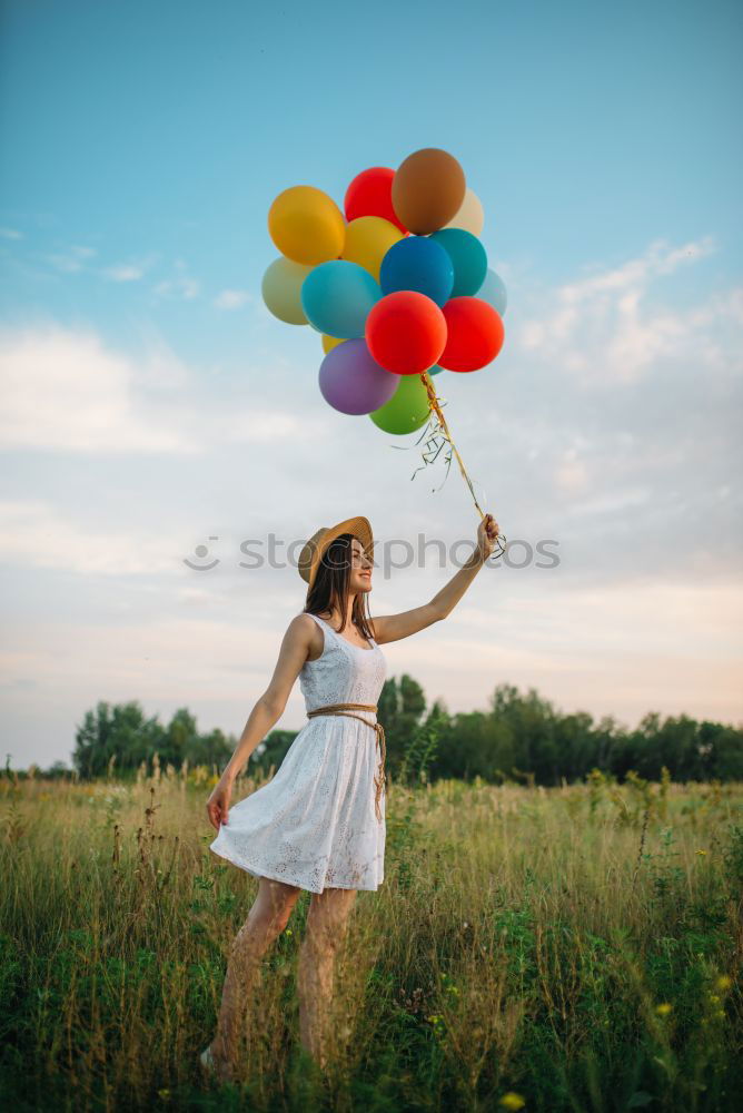 Similar – Image, Stock Photo Woman holding the Gay Rainbow Flag on green meadow outdoor