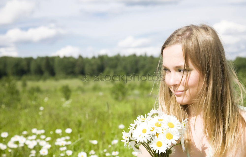 Similar – aerial Hand Dandelion Blow