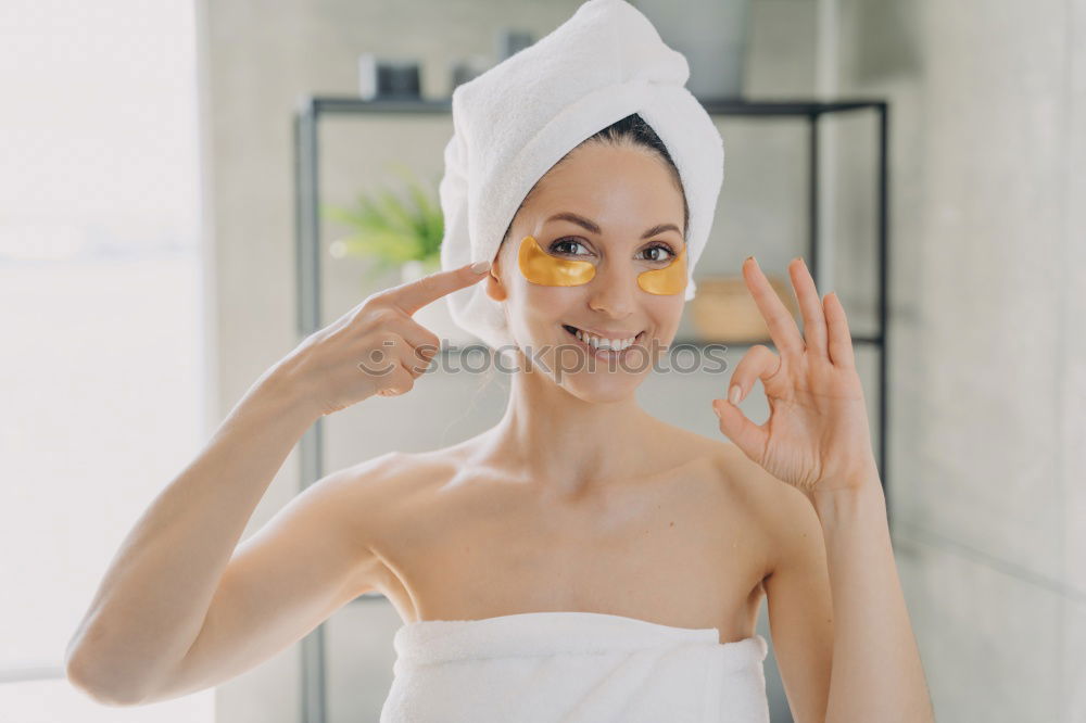 Similar – Playful mischievous woman with wet hair in a towel