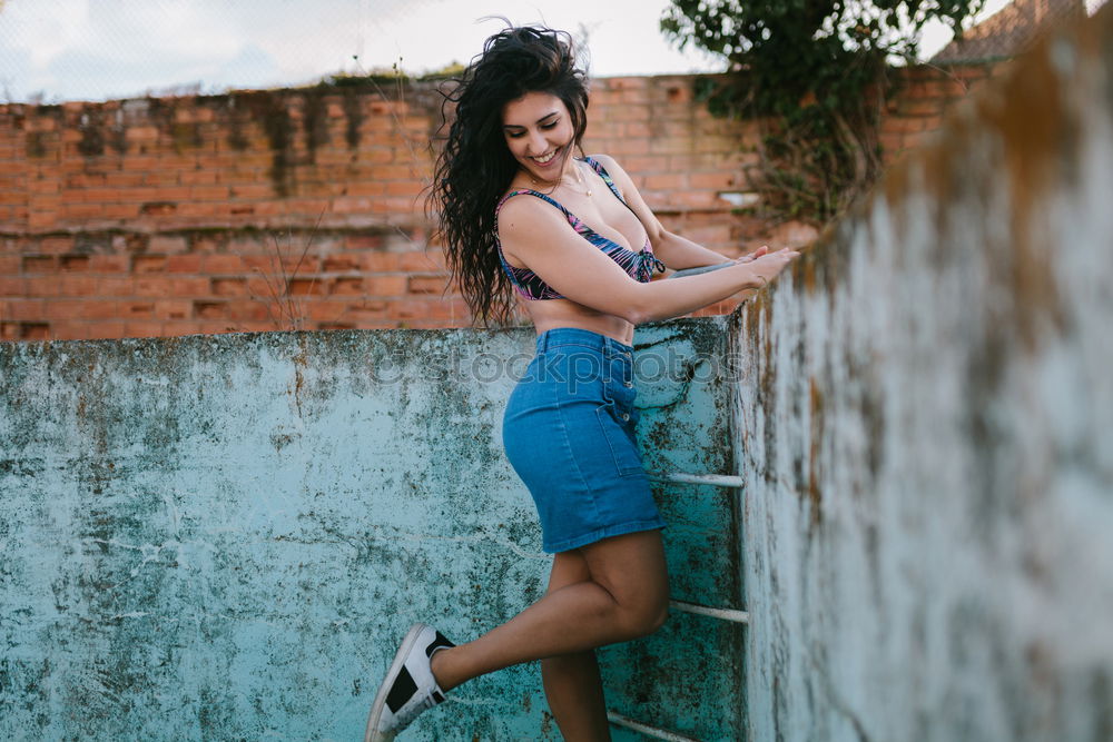 Similar – Woman posing in abandoned building