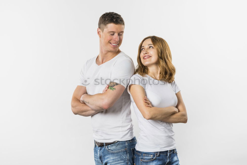 Similar – Image, Stock Photo Beautiful young couple hugging, looking at camera and smiling