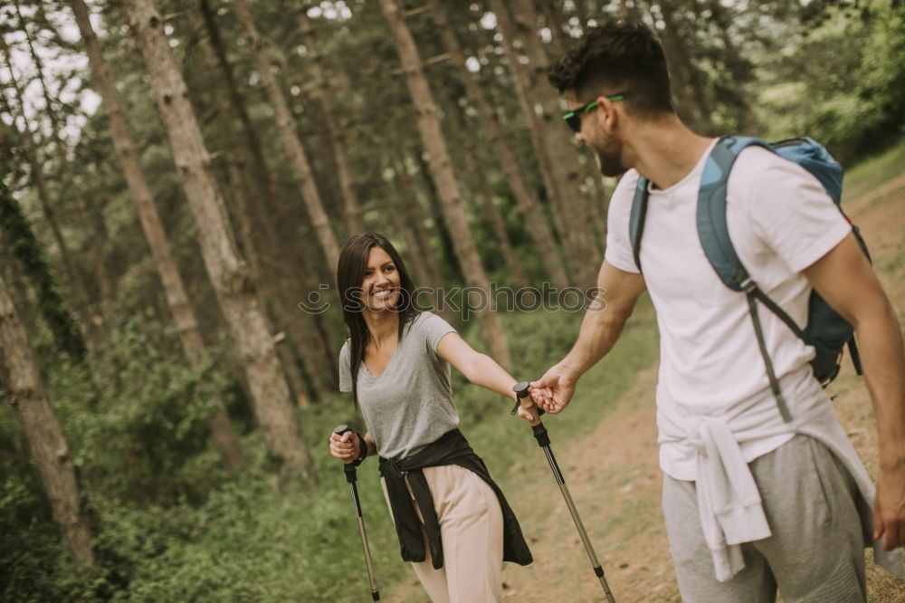 Couple of hikers doing trekking