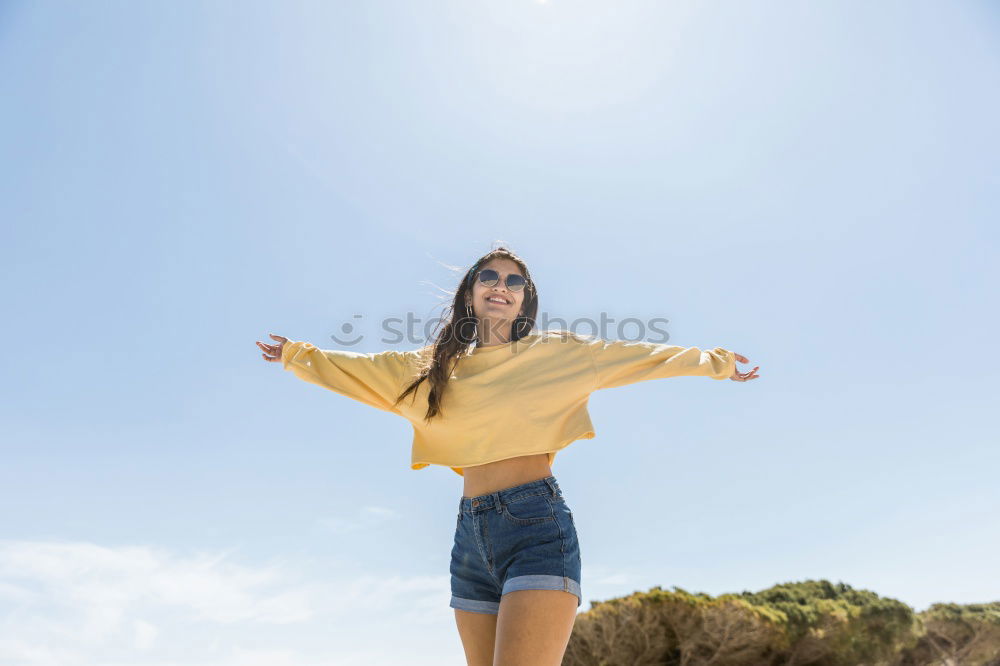 Similar – Brunette woman on a lifeguard tower