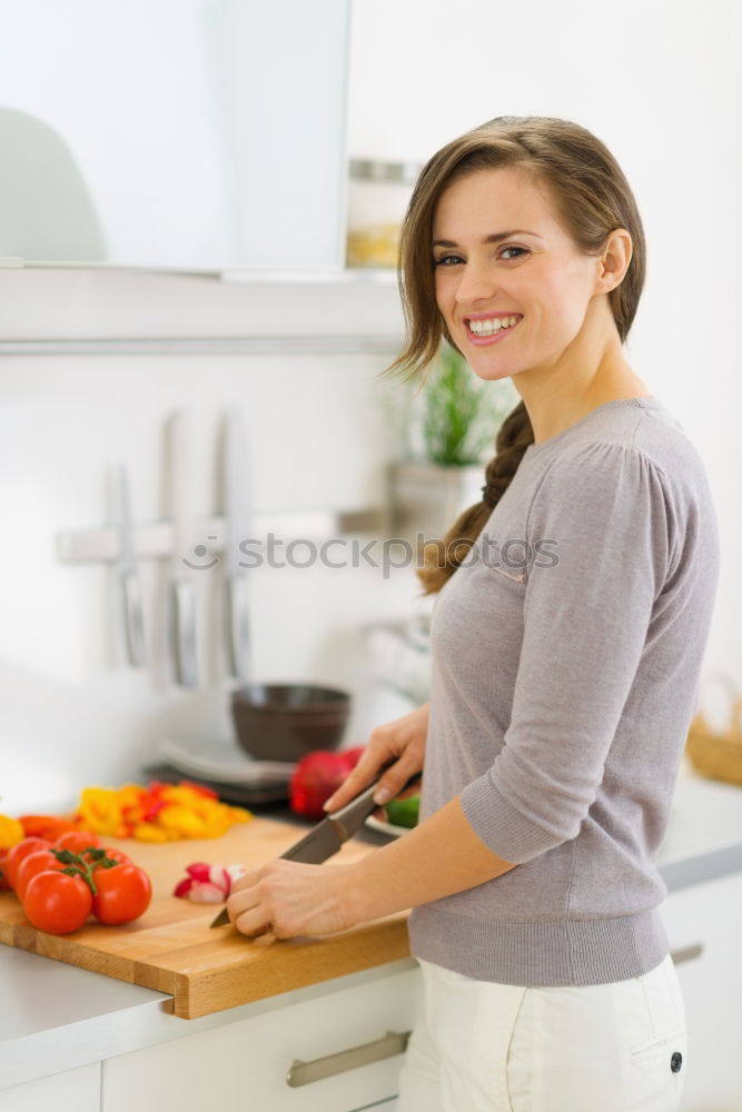 Similar – Young couple cooking. Man and woman in their kitchen