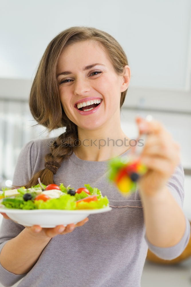 Similar – Crop woman eating sushi