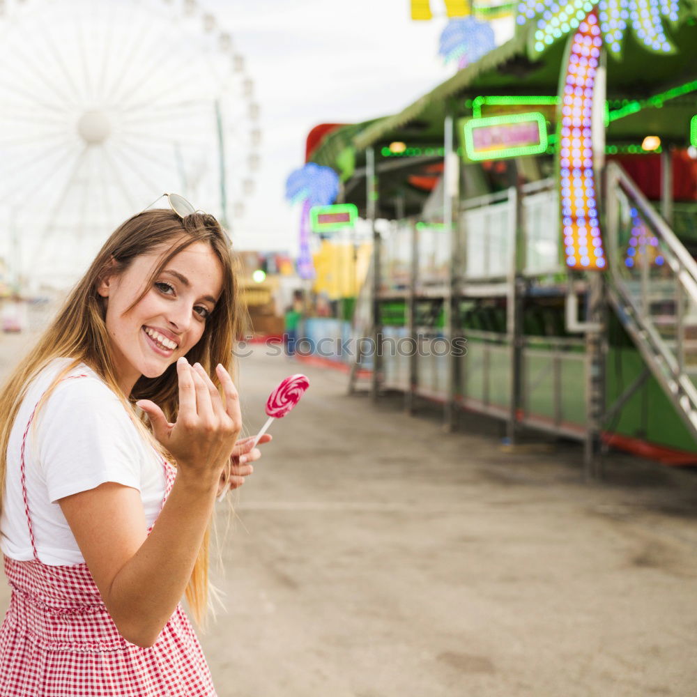 Similar – beauty girl with a cotton candy in a fair