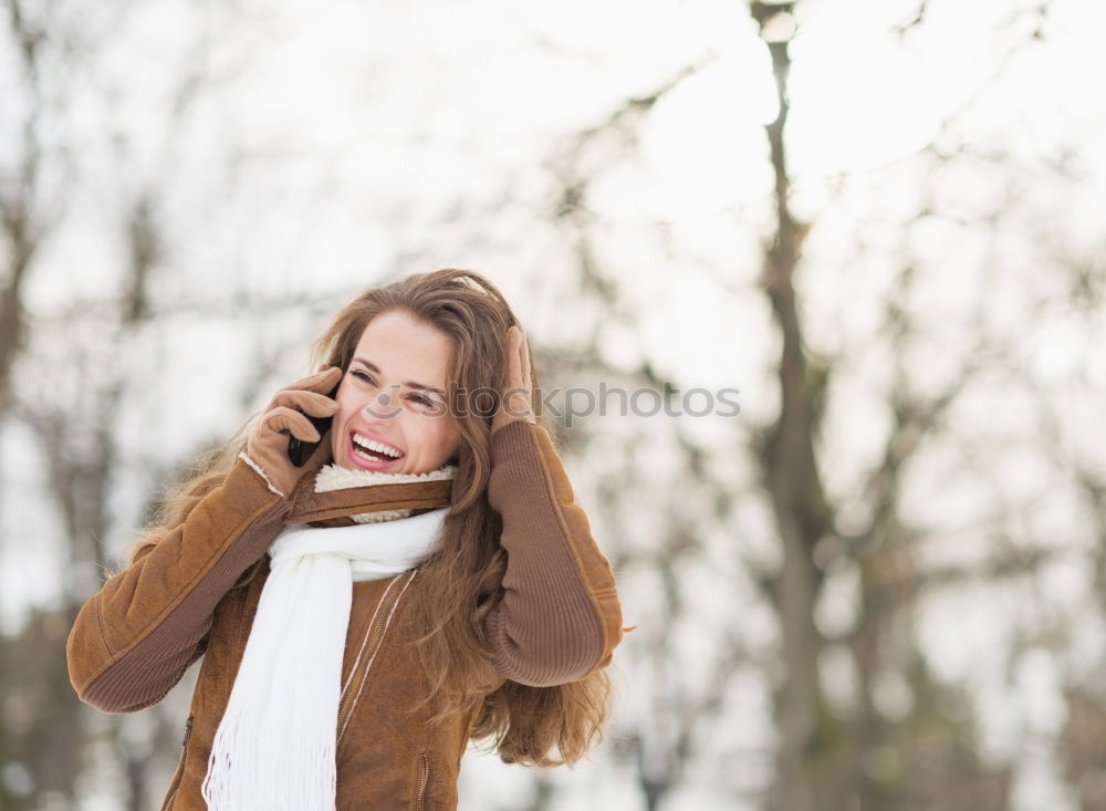 Similar – Image, Stock Photo Portrait of a Young woman using her mobile phone.