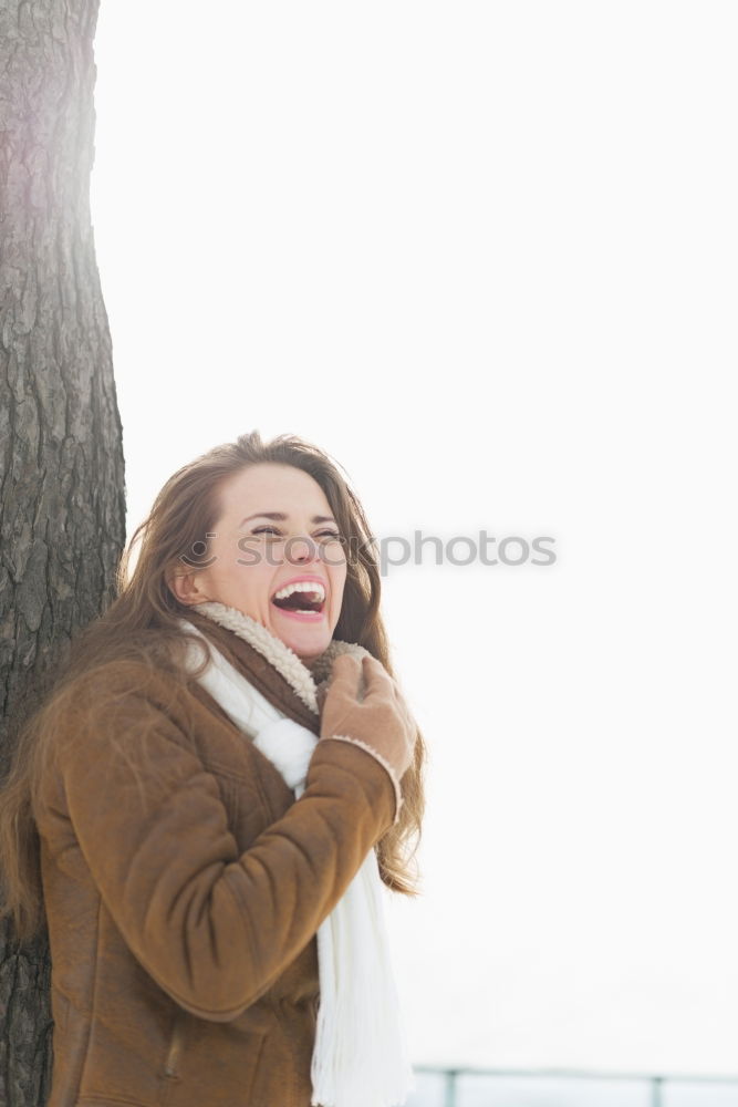 Similar – Image, Stock Photo Portrait of a Young woman using her mobile phone.