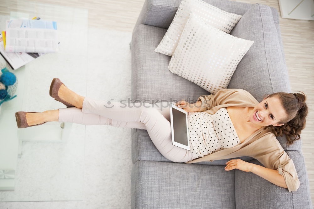 Similar – Image, Stock Photo Smiling woman lying on table