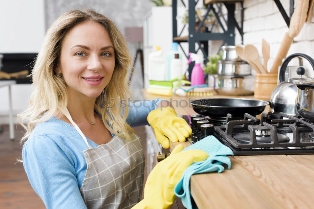 Similar – Young woman with kitchen knife