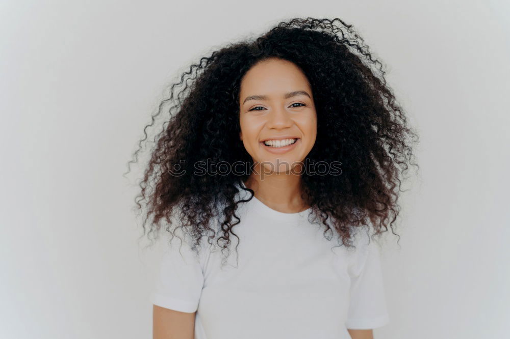 Similar – Young happy woman surrounded by green leaves