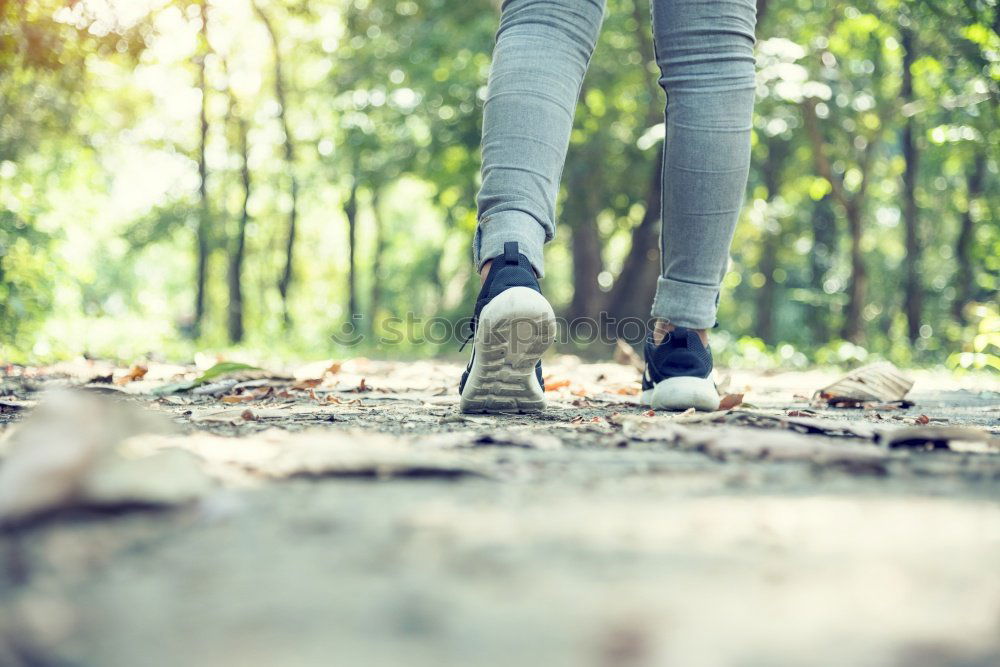 Similar – Image, Stock Photo Young woman jogging down an autumn street