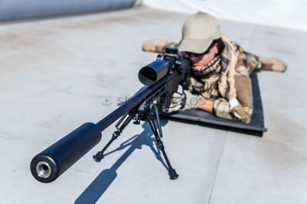 Similar – Image, Stock Photo Young photographer playing with accessories for professional camera like with rifle while lying on floor