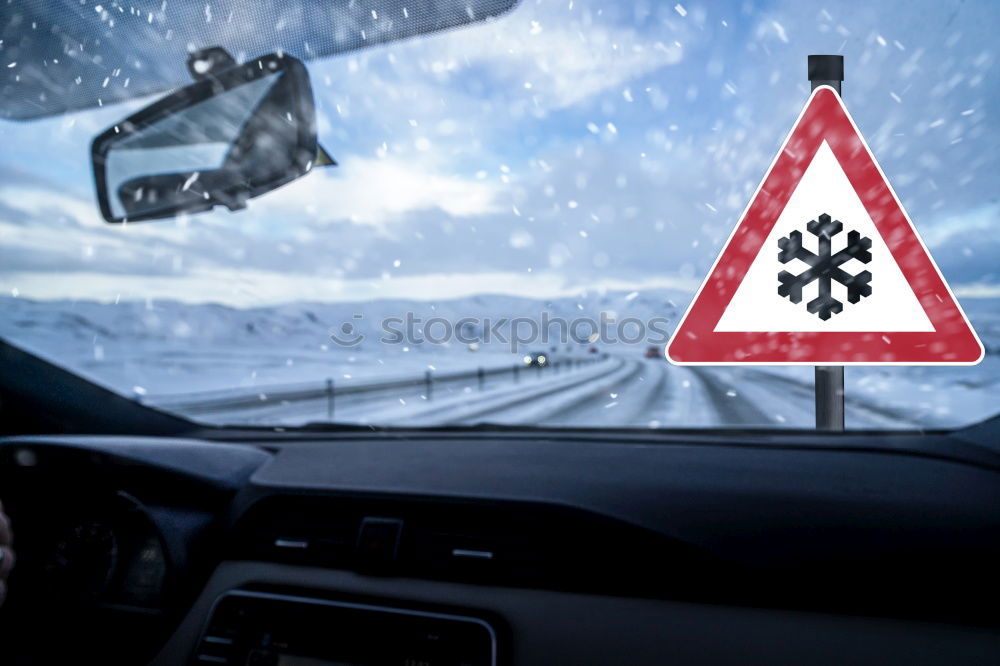 Similar – Person driving in snowy day