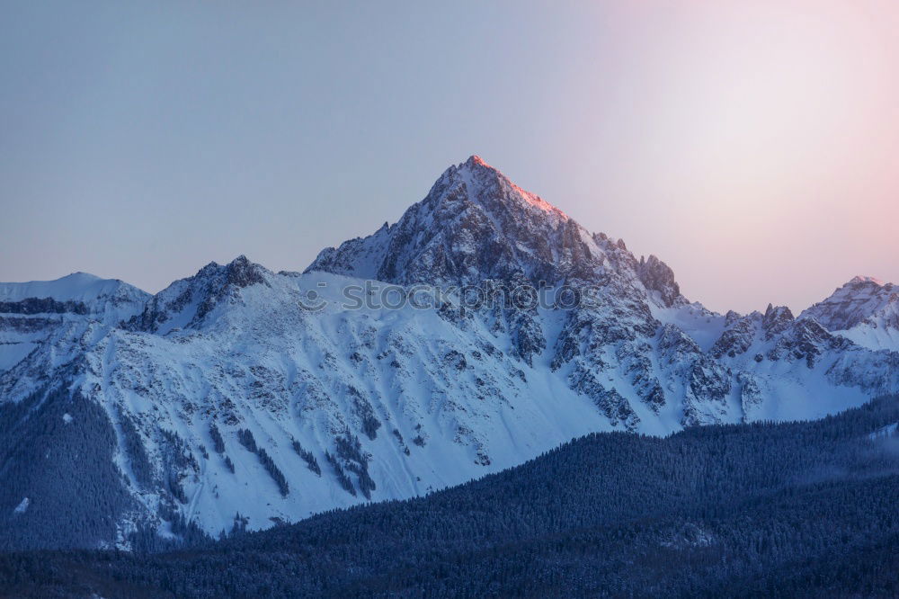 Similar – Sunset over the winter mountains