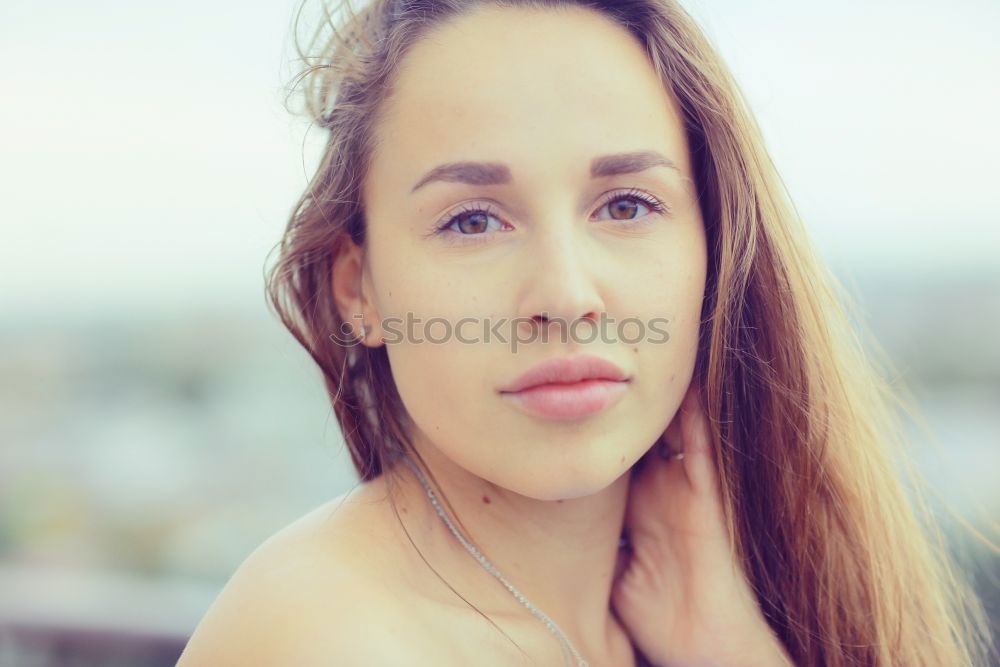 Similar – A young girl sits thoughtfully in a pink shopping trolley amidst pink goods