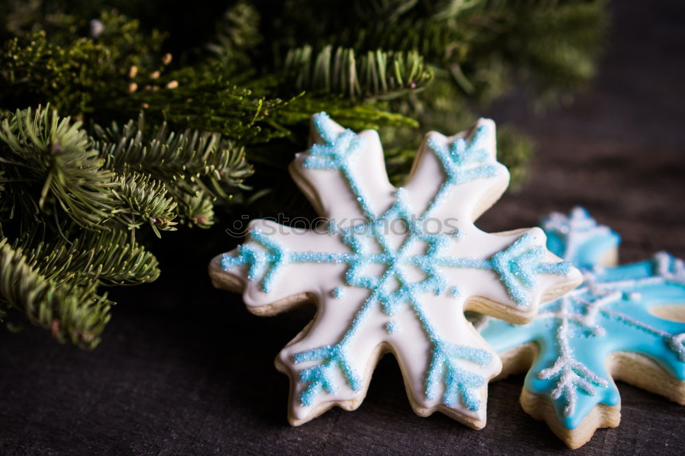 Similar – Image, Stock Photo Yellow cookies lying on the table with Christmas tree and gifts