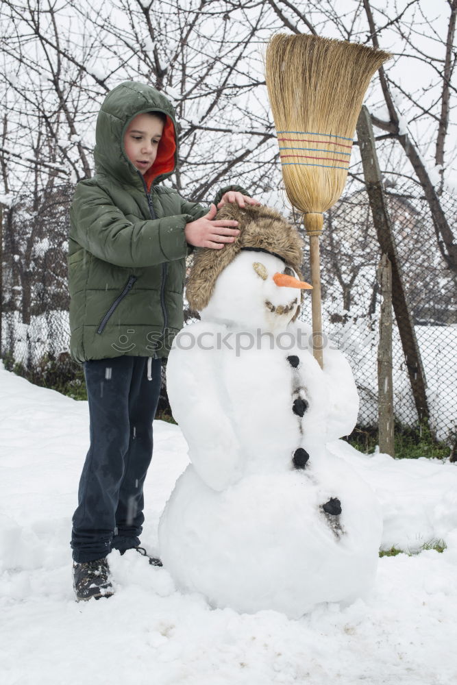 Image, Stock Photo Snowman and child in the yard
