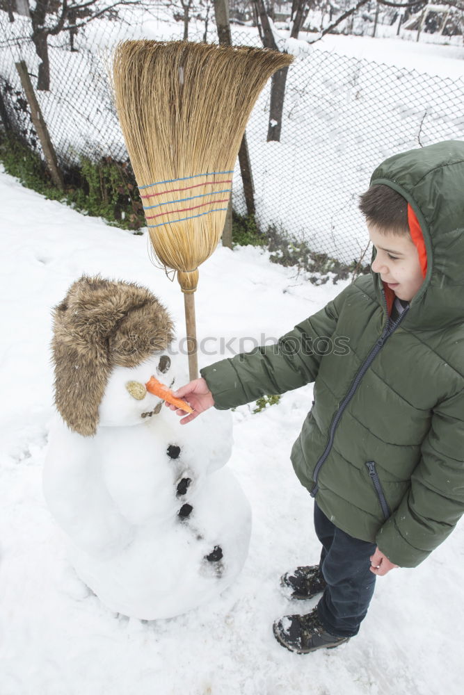 Similar – Image, Stock Photo Snowman and child in the yard