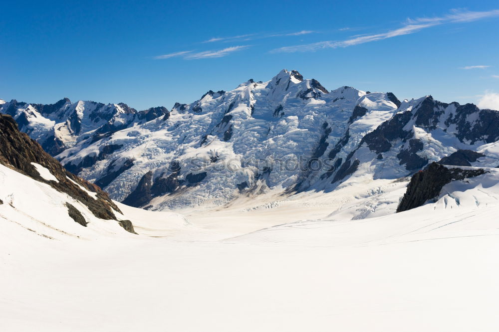 Similar – Image, Stock Photo Snowy blue mountain peaks in clouds