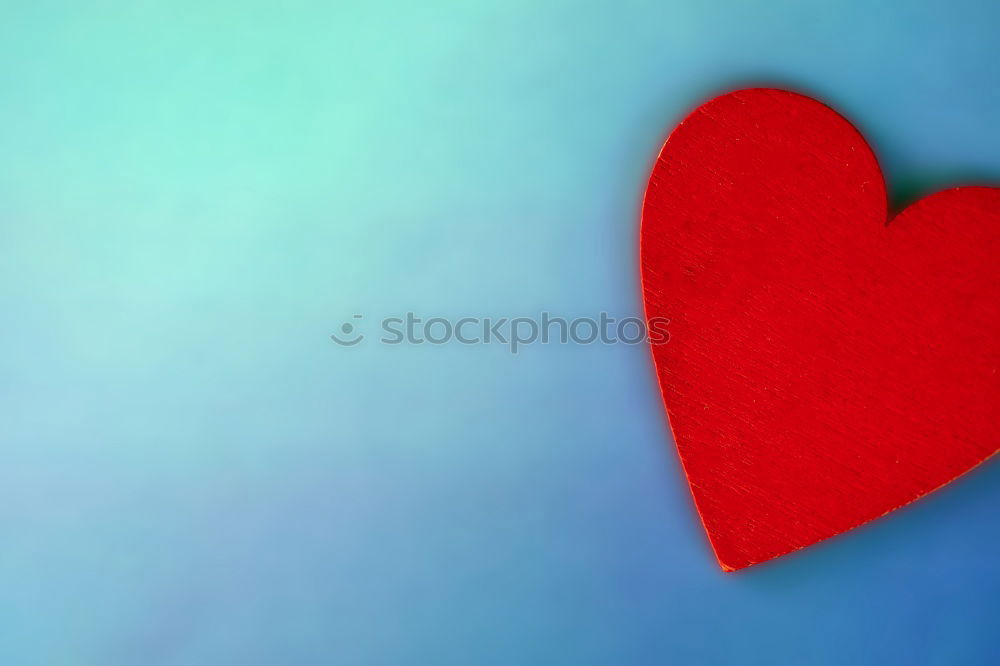 Similar – Image, Stock Photo Three stitched toy hearts, pink, red and teal on blue felt