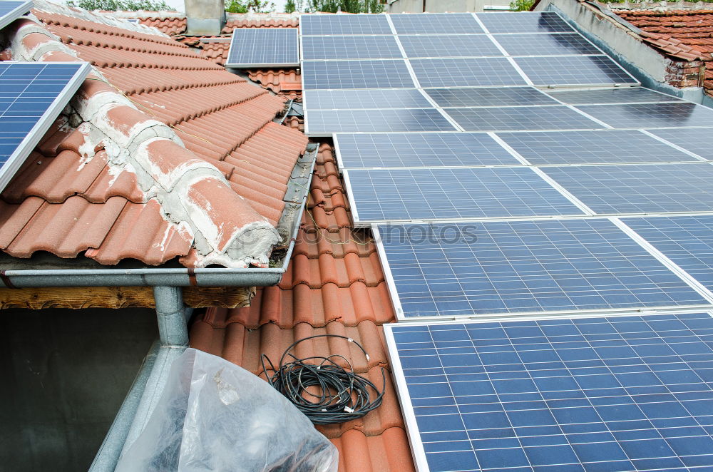 Similar – Allotment garden idyll: Solar panels on the garden house