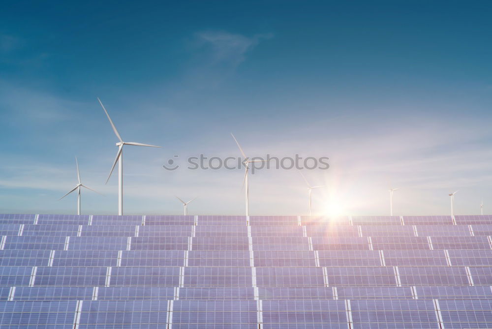 Similar – Photovoltaic panels in a solar power plant over a blue sky.